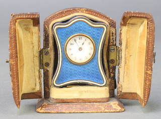 An early 20th Century Continental silver and blue guilloche enamel bedroom timepiece 1 3/4", contained in a fitted case with key 