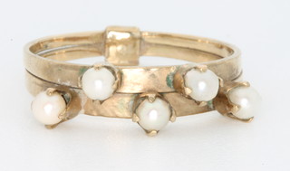 A 14ct yellow gold pearl set ring, size N