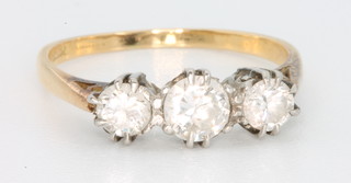 An 18ct yellow gold 3 stone diamond ring, size M, approx 0.5ct 