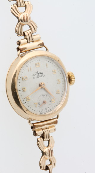 A lady's 9ct yellow gold Avia wristwatch with seconds at 6 o'clock on a gilt bracelet 