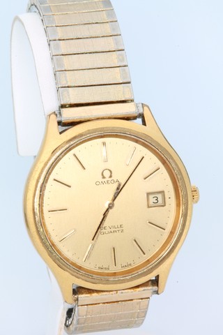 A gentleman's gilt cased Omega Deville quartz calendar wristwatch on an expanding bracelet 