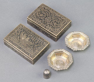 A pair of Victorian hexagonal silver salts, a pair of Thai silver and niello boxes and a thimble 