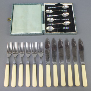 A set of 6 Art Deco silver and enamelled coffee spoons Birmingham 1933, 56 grams, a set of silver plated fish eaters for 6