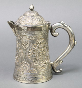 An Indian repousse silver coffee pot decorated panels of hunting scenes 534 grams