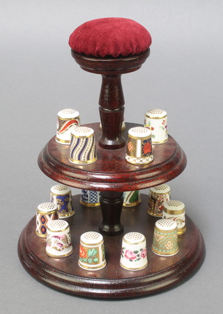 15 Royal Crown Derby Japan pattern thimbles on a 2 tier stand 