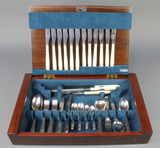 A rosewood canteen containing a set of Arthur Price cutlery for 6 