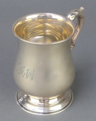A silver baluster mug with S scroll handle, Birmingham 1927, 225 grams