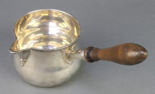 A George III silver brandy warmer of plain form with turned wood handle, London 1811 9" 