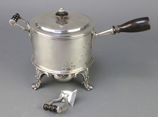 A circular silver egg coddler of plain form, the lid with turned finial having 3 detachable  handles with turned wood ends, the interior with a 6 division insert, raised on a Victorian silver base with burner, London 1839 
