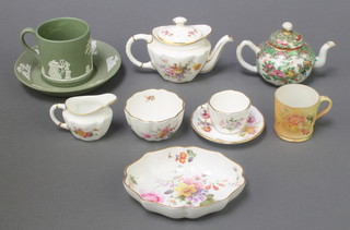 A Royal Crown Derby, Derby posies miniature tea set with teapot, cream jug, sugar bowl, tea cup and saucer and dish, a Cantonese teapot, a Wedgwood tea cup and saucer and Worcester miniature mug 