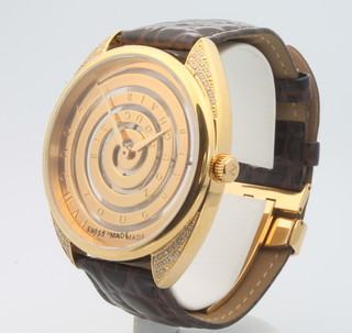 A gentleman's Zoughaib gilt stainless steel, diamond set, spiral faced quartz wristwatch with visible mechanism on a leather strap with gilt clasp 