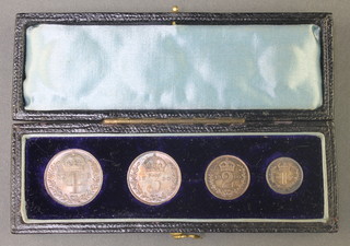 A Maundy coin set 1900 in a fitted blue Moroccan case 