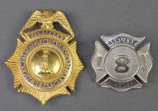 An American Fire Services badge with gilt and enamel decoration Lieutenant Metropolitan Dade County Fire Department, a chromium ditto Ash Lane Fire Dept. no.8