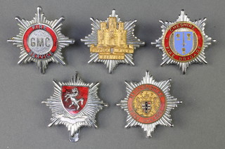 Five chromium and enamelled Fire Service cap badges 