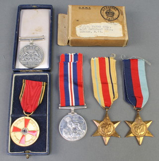A Cold War Order of Merit, boxed, a World War  II group 1939-45 and Africa Star, Defence and British War medal, in posting box to F J G Payne Esq