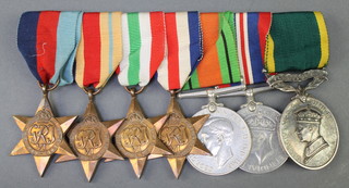 A World War II group 1939-45 Africa, Italy, France and Germany stars, Defence, British War medal and Territorial Efficiency medal to 3530706. Pte.L.Chamberlain R.P.C. 