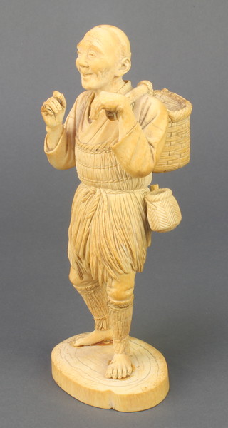 An early 20th Century Japanese carved ivory okimono of a farm worker holding a basket over his shoulder with a flask and bag at his waist signed 8 1/4" 