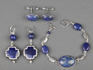 A pair of silver coloured and lapis lazuli cuff links a ditto bracelet and pair of earrings 