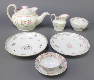 A 19th Century English teapot and a milk jug decorated with floral sprays, a teabowl and saucer, 2 dishes and a slop bowl 