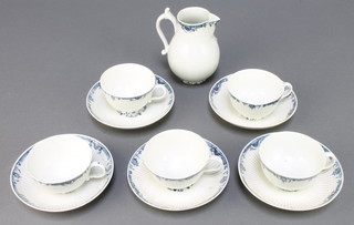A 19th Century Worcester ribbed part tea set with blue and white decoration decoration comprising 5 tea cups and saucers and a cream jug 