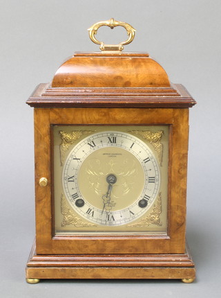 A Queen Anne style striking bracket clock with square gilt dial, silvered chapter ring and Roman numerals, the dial marked Arthur Saunders of London contained in a walnut case 

