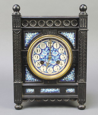 A French 19th Century 8 day striking mantel clock contained in a blue floral enamelled and ebonised case with Arabic numerals,  