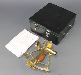 A reproduction brass and mahogany sextant 8" in a mahogany carrying case