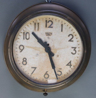 A Smiths Fecit electric wall clock with 11 1/2" painted dial with Arabic numerals contained in a gilt metal case 
