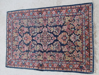 A red and blue ground and floral patterned Persian Mahal rug 76 1/2" x 51"