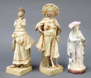 A pair of Royal Dux style figures of a Continental lady and gentleman on raised bases 12", a bisque figure of a boy with dog 9" 