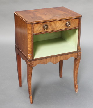 A Georgian style mahogany bedside cabinet with crossbanded top, fitted a drawer above recess, raised on square tapering supports 26"h x 16 1/2" x 12"w 