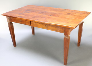 A 19th Century rectangular Continental hardwood dining table fitted 2 frieze drawers, raised on square tapered supports 31 1/2"h x 63"l x 35 1/2"w 