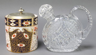 An Edwardian Davenport Japan pattern biscuit barrel with plated lid 5" and a  circular flattened decanter and stopper 8" 