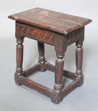An 18th Century oak joined stool raised on turned and block supports with box stretcher 20"h x 19"w x 12"  
