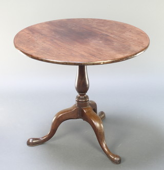 A 19th Century mahogany circular snap top tea table, raised on a pillar and tripod base 27" x 31" diam. 