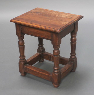 A 19th Century rectangular oak joined stool raised on turned supports with X framed stretcher 16"h x 14 1/2"w x 12"d 