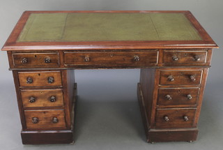 A Victorian mahogany desk with inset leather writing surface above 1 long and 8 short drawers 29 1/2"h x 48"w x 25"d 