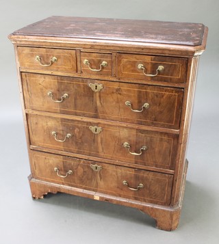 A "Queen Anne" style walnut book press chest with canted corners, fitted 3 short drawers above 3 long drawers with brass escutcheons and swan neck drop handles, raised on bracket feet 35"h x 32"w x 17"d 