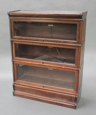 An oak 3 tier Globe Wernicke bookcase, each section labelled Globe Wernicke, 43 1/2"h x 34"w x 12"d 