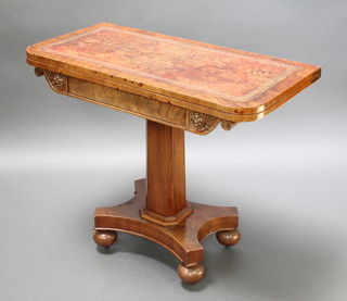 A William IV mahogany D shaped card table with inset brown leather writing surface, raised on a square chamfered column and platform base with bun feet 39 1/2"h x 36"w x 17 1/2"d 