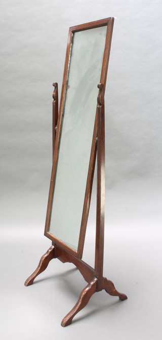 A 1930's rectangular bevelled plate cheval mirror contained in an oak frame 60"h x 17"w 