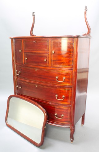 An Edwardian inlaid mahogany bow front dressing chest, fitted 2 short drawers flanked by a pair of cupboards above 3 long drawers, raised on cabriole supports with arch plate mirror to back, 66"h x 38 1/2" w x 21"d