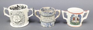 A 19th Century blue glazed twin handled loving cup with motto - I'm an odd fellow and have an odd wife, to spend together the odd days of my life ..., 4" (chip to base), a 19th Century style twin handled loving cup and a 1973 Wade Potteries cider mug decorated The Farmer's Prayer 