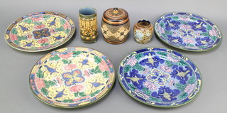 A Doulton Lambeth cylindrical tobacco jar and cover, base impressed Doulton Lambeth and incised B 4", a Doulton Lambeth & Slater squat vase with floral decoration 3", a Doulton Lambeth spill vase on 3 bun feet impressed Royal Doulton 8930 5", 2 pairs of Doulton Series ware plates with floral decoration marked D3087 and D3088 (1 cracked) 10 1/2"  