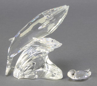 A Swarovski figure of a blue whale, base marked SCS92MST (boxed) and 1 other of a cygnet (beak f) 