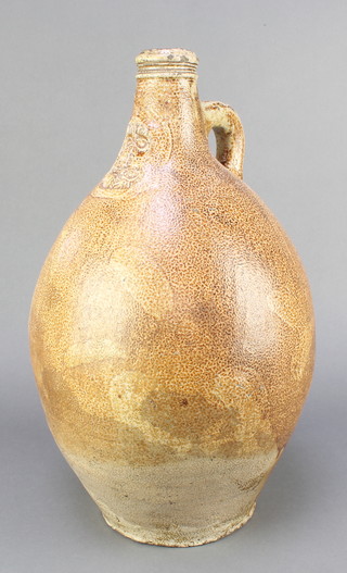 A 17th/19th Century style German salt glazed "Tiger Ware" flagon, the handle with thumb print decoration 17" 