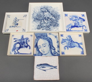 A Delft blue and white pottery tile depicting The Virgin Mary 5" and 1 other of a fish 4 1/2", 4 framed ditto of Knight and Musketeer and a blue and white tile of a gun dog  