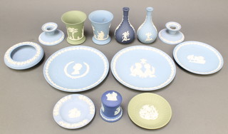 A pair of Wedgwood blue Jasperware squat shaped candlesticks 4", do. bowl 5", 2 do. club shaped specimen vases 5 1/2", other items of Jasperware