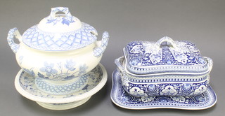 A Victorian blue and white twin handled tureen and cover complete with stand 7" (stand cracked), a Victorian stone china blue and white pedestal bowl 12", a Victorian Copeland Garrett blue and white transfer decorated tureen and cover 13" 