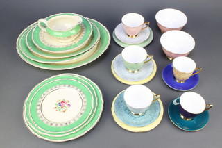 A Grindley 30 piece Hazelmere pattern dinner service comprising 3 graduated pottery meat plates, 6 soup bowls (1 f), 6 dinner plates (1 chipped to rim), 6 side plates (2 cracked) sauce boat, 2 tureen lids and a 72 piece Royal Albert Gossamer pattern tea/coffee service with 2 twin handled plates, 17 tea plates, 2 cream jugs, 2 sugar bowls, 15 tea cups (1 cracked) and 15 saucers, 9 coffee cans (2 cracked) and 9 saucers  